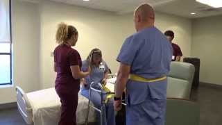 Physical Therapy Transfer Training  How To Transfer From Wheelchair To Bed [upl. by Akerley]